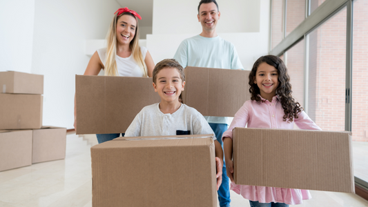 Happy family moving to their new house