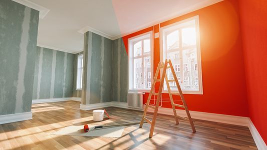 Painting wall red before in room before and after restoration