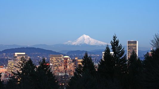 View of Portland, Oregon from the west hills after the sunset. Mt. Hood in the background.