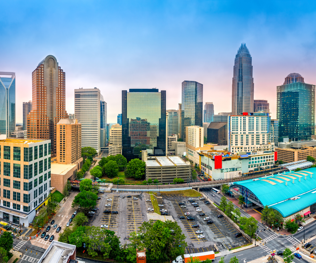 <img src=“City of Charlotte.png” alt=“Aerial view of Charlotte, North Carolina”>