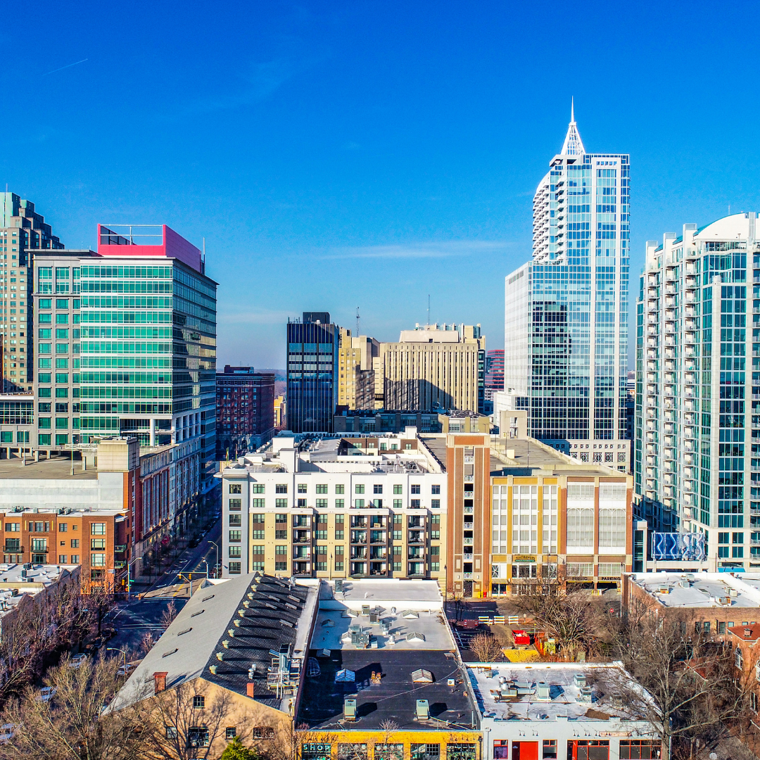 alt="skyline aerial view  buildings in Raleigh, NC"