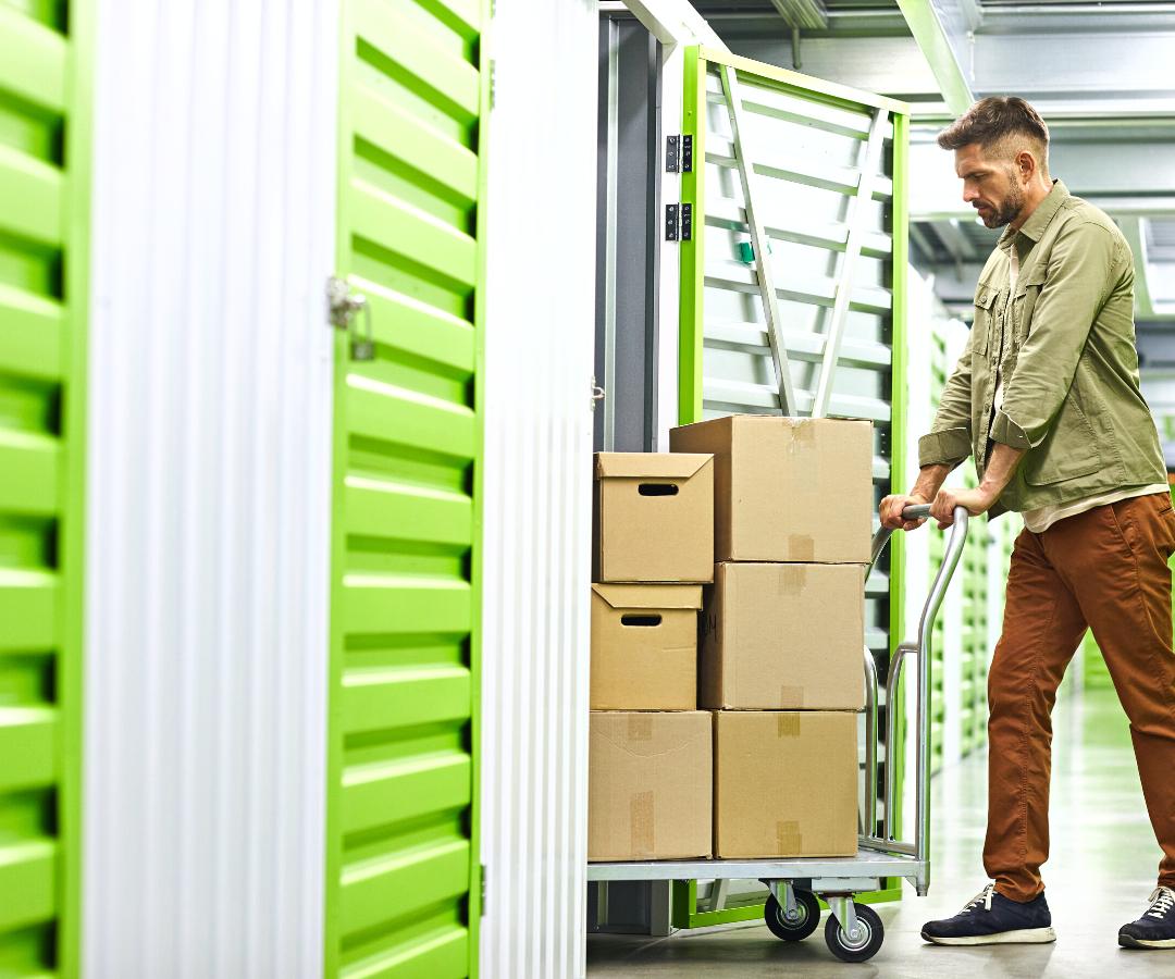 Caddy Mover, Jake, moving boxes with a hand truck into a self storage facility