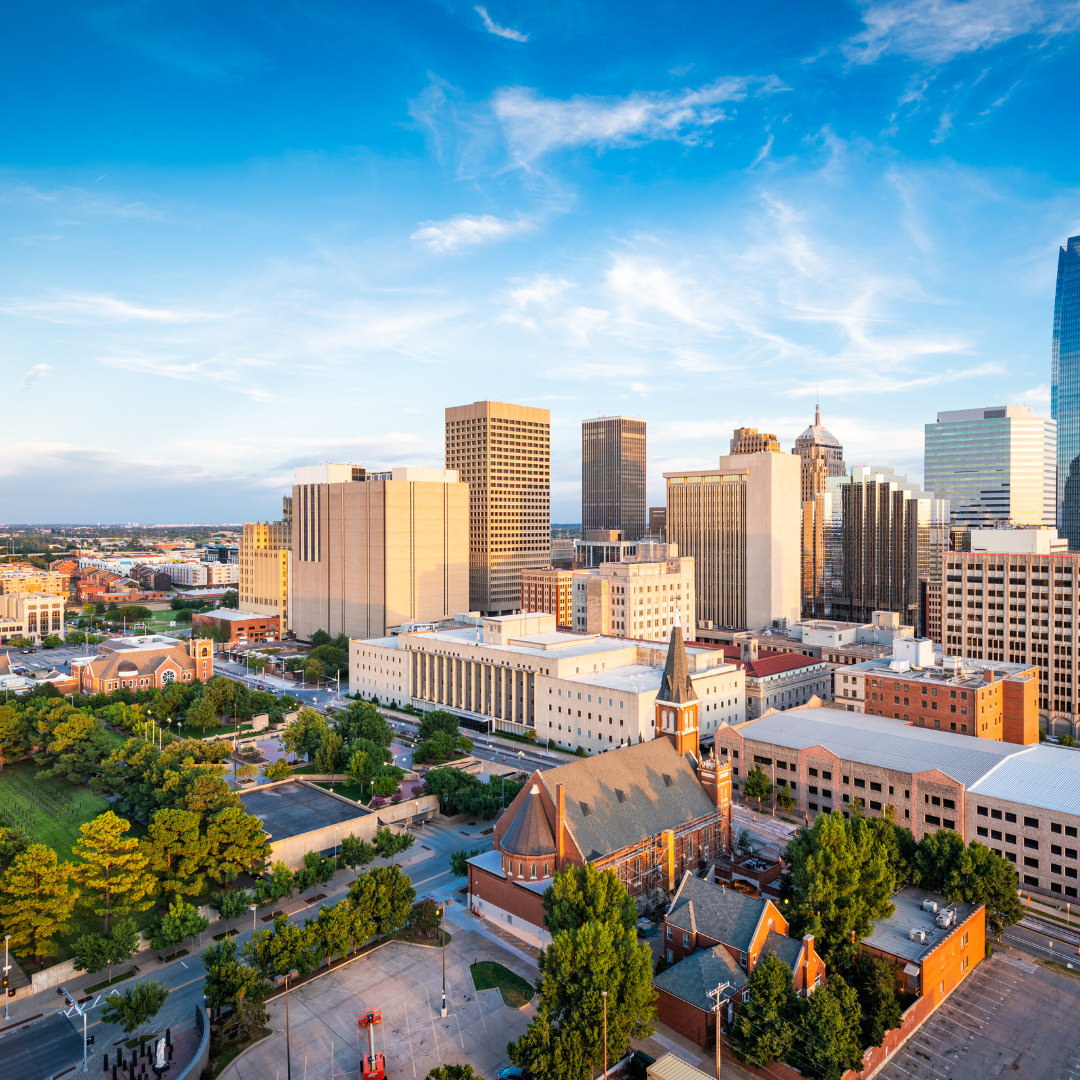 alt="High rise building in downtown area at Oklahoma City, OK"